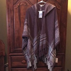 Cozy, brand new, cape with hood.